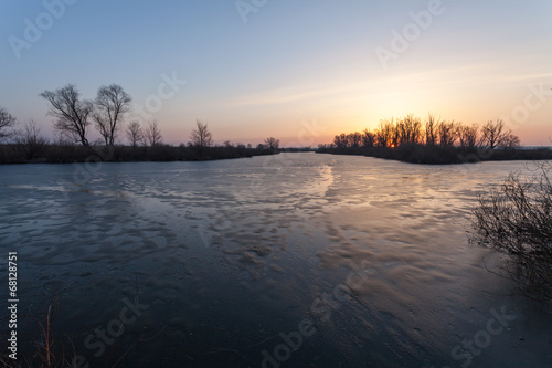 Winter landscape  dawn over the river
