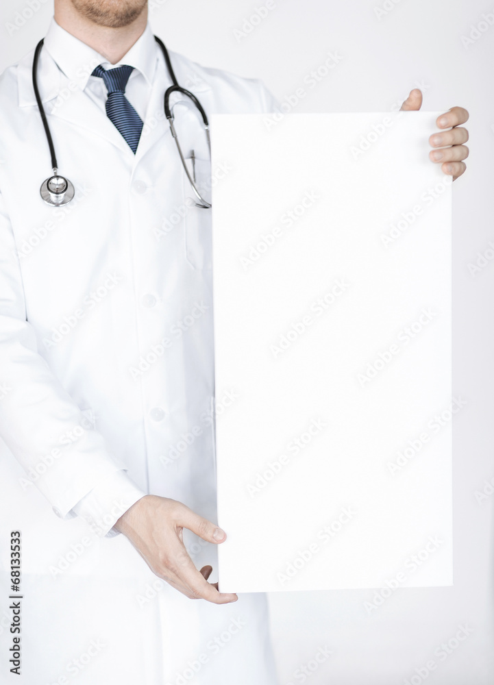 doctor holding blank white banner
