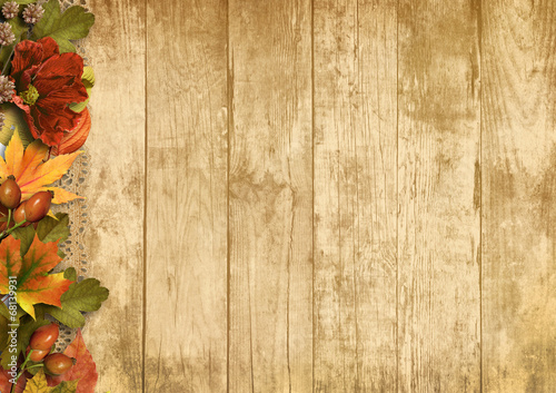 Vintage wooden background with autumn decorations