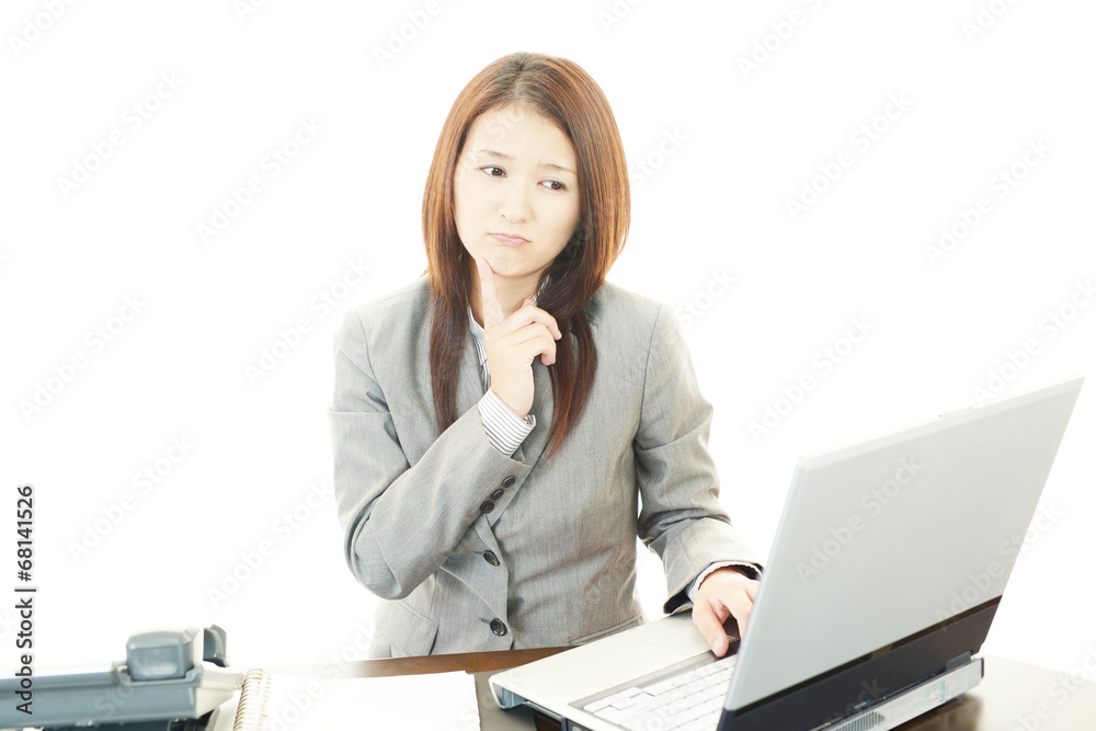 疲れた表情のOL 疲れた表情のOL