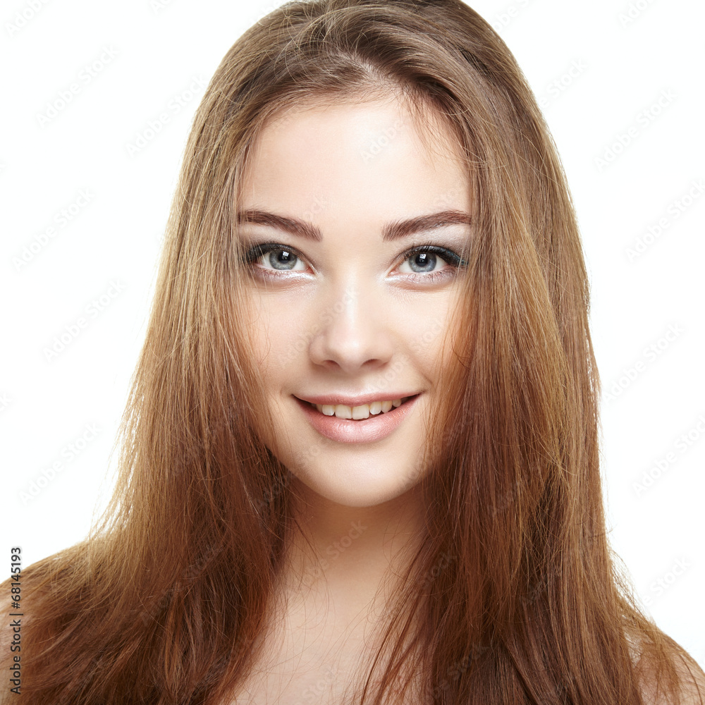 Beauty woman face. Young girl smiling. Isolated on white backgro Beauty woman face. Young girl smiling. Isolated on white backgro