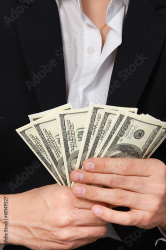 Man shows money dollars wealth millionaire