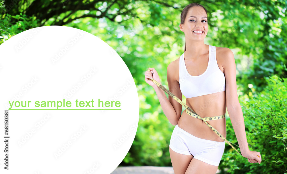Slim girl with tape on bright background Slim girl with tape on bright background
