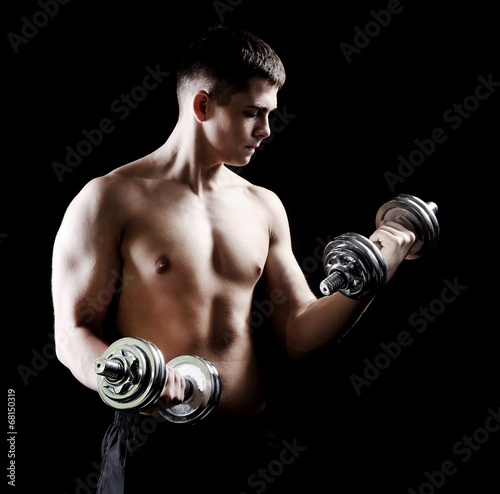 Young muscular sportsman wi...