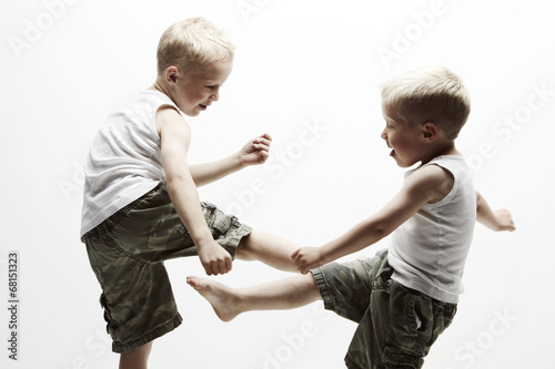 Portrait of two brothers fighting