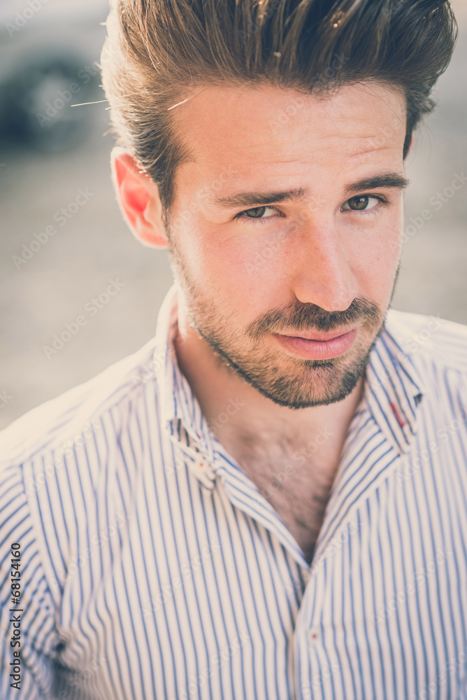 Fototapeta premium young handsome hipster modern man outdoor
