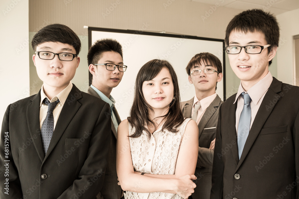 Group of business people with businessman leader on foreground Group of business people with businessman leader on foreground