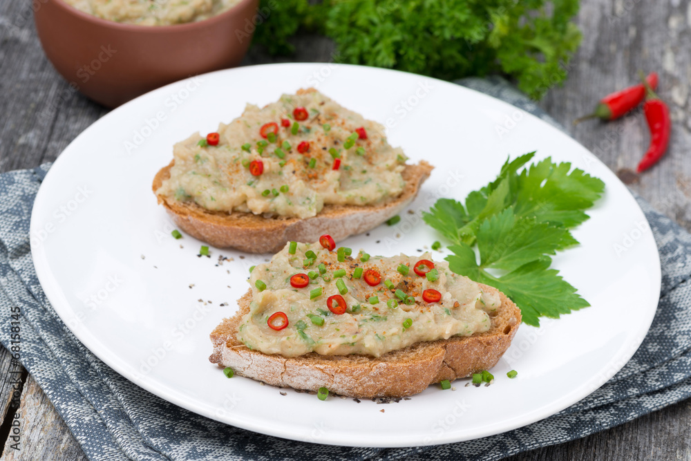 pate of white beans with spices on bread, horizontal