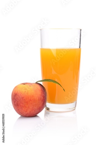 Close-up shot sliced orange peach with juice and leaf