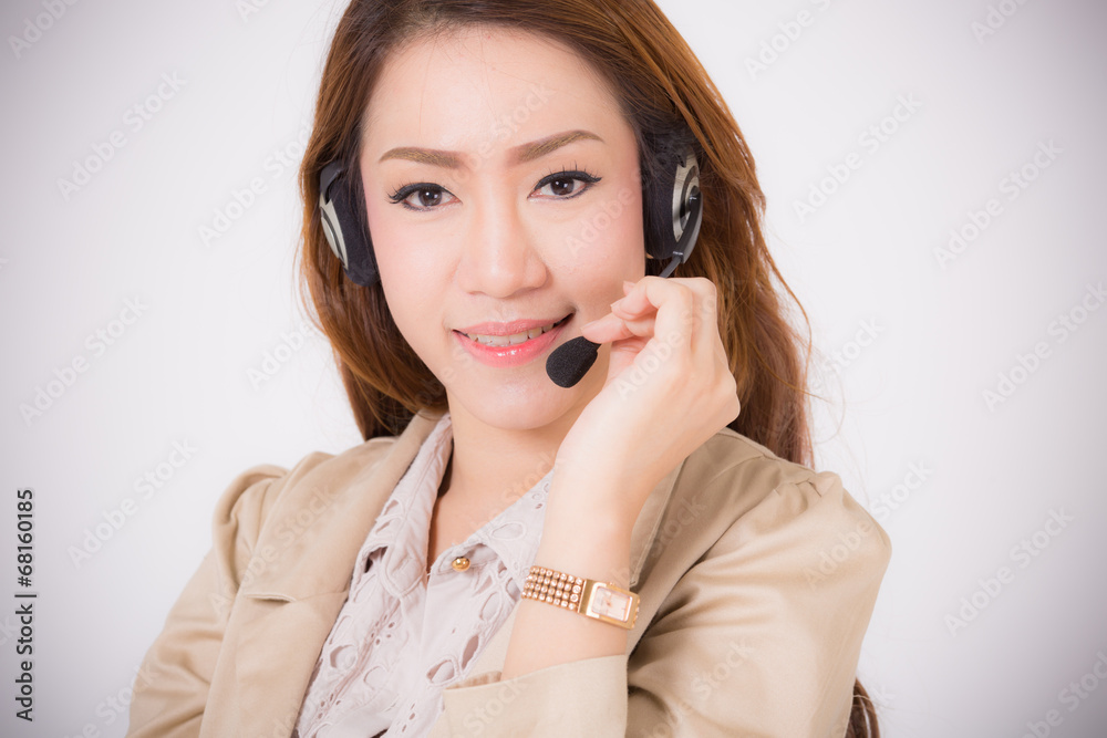 Portrait of happy smiling cheerful support phone operator in hea Portrait of happy smiling cheerful support phone operator in hea
