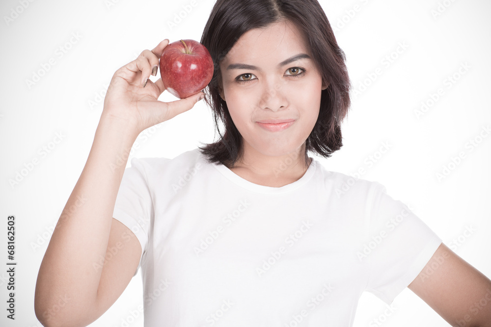 Smiling woman with apple isolated on white Smiling woman with apple isolated on white
