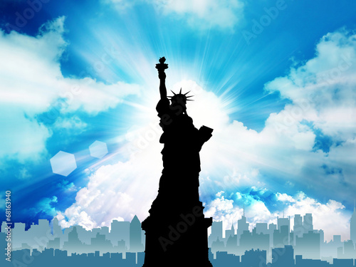 the statue of liberty in the heaven background. photo
