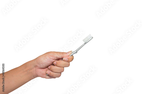 Women holding a toothbrush