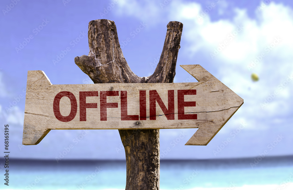 Offline wooden sign with a beach on background