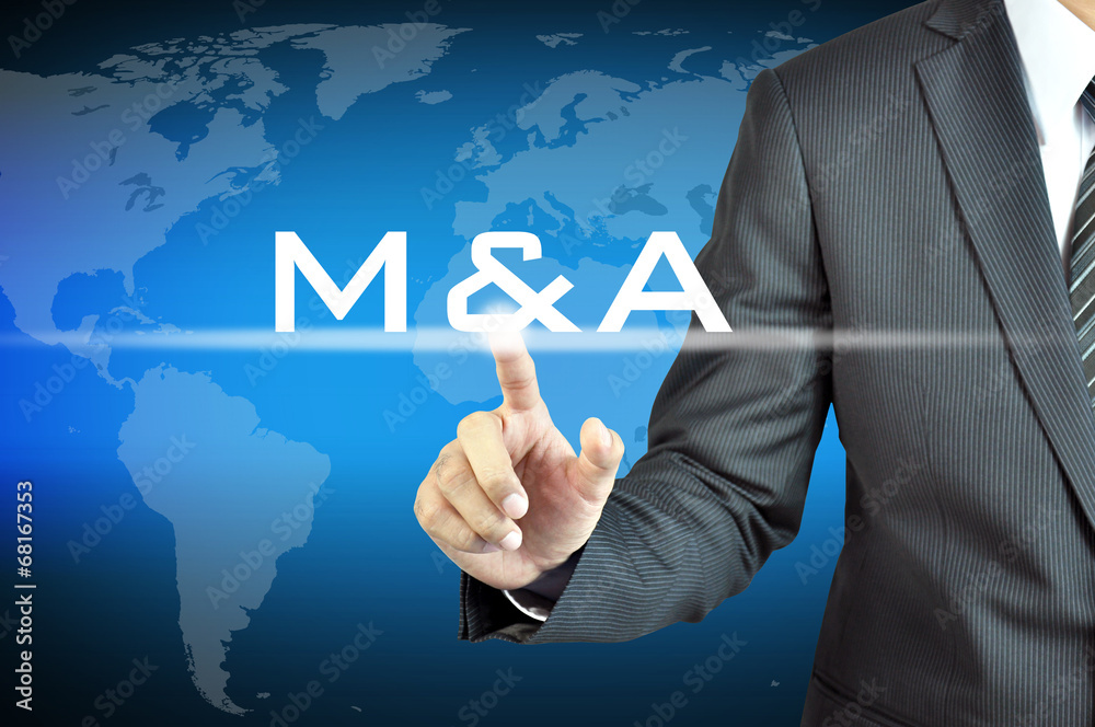 Businessman hand touching M & A - merger & acquisition concept Businessman hand touching M & A - merger & acquisition concept