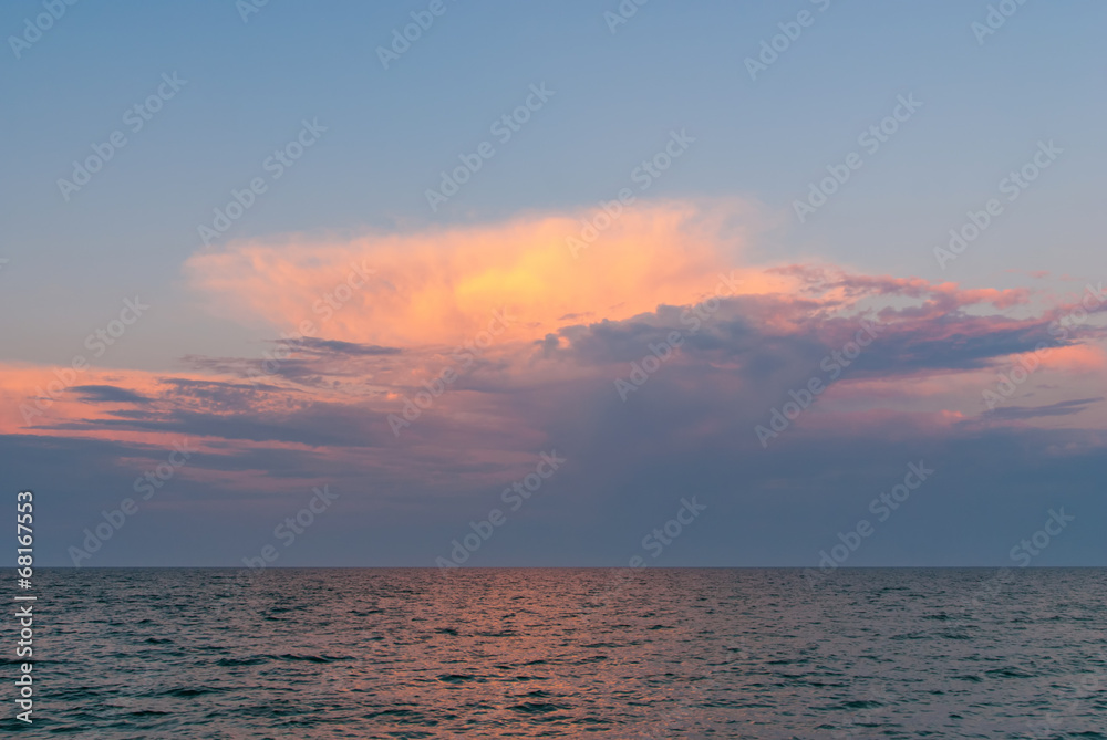 Beautiful seascape with orange warm sunrise