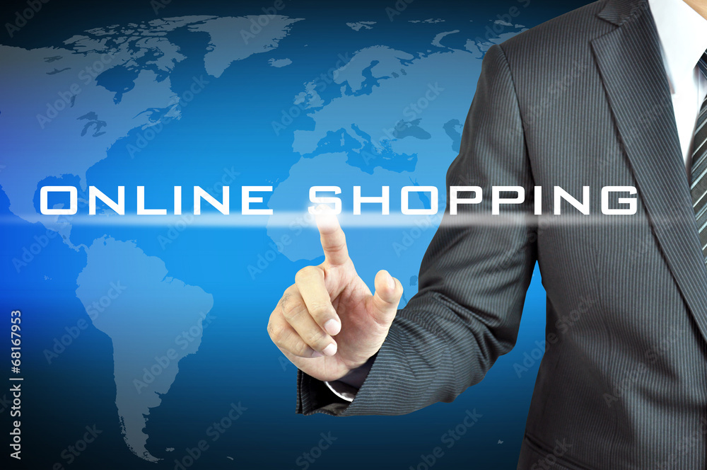 Businessman hand touching ONLINE SHOPPING sign on virtual screen