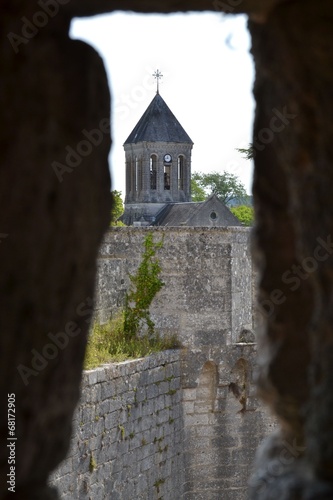 Принти на полотні Bourdeilles church trough a loophole of the castle