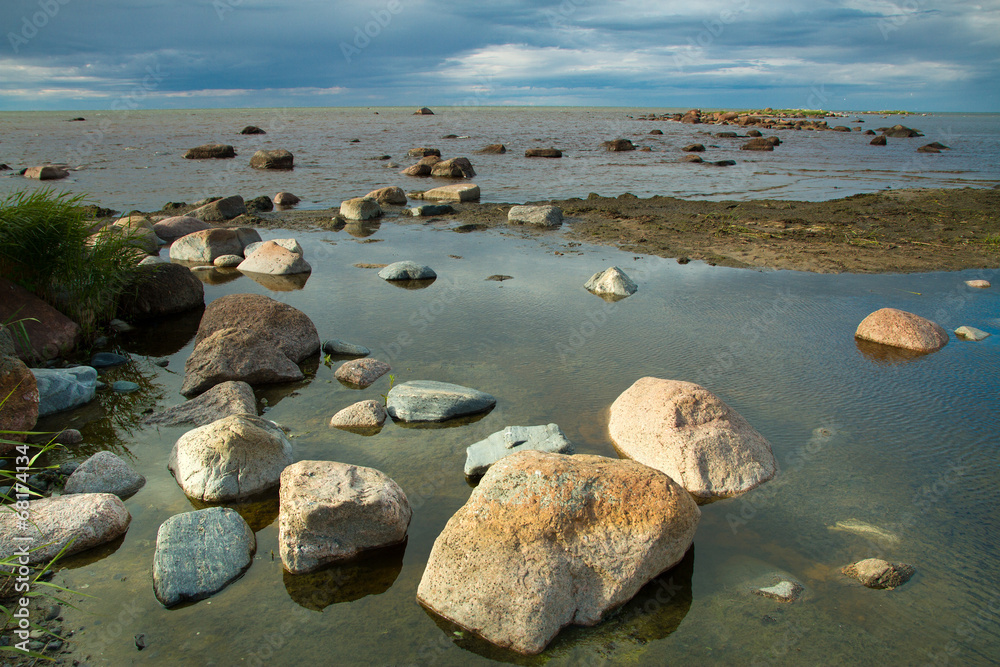 rocks into the sea