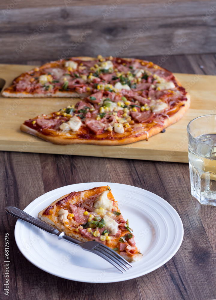 pizza with sausage, chicken, corn and cheese pizza with sausage, chicken, corn and cheese