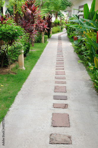 Beautiful walk-way through into park © ZhouEka