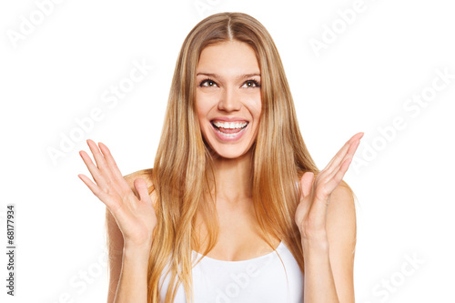 Surprised happy woman looking up in excitement. Isolated