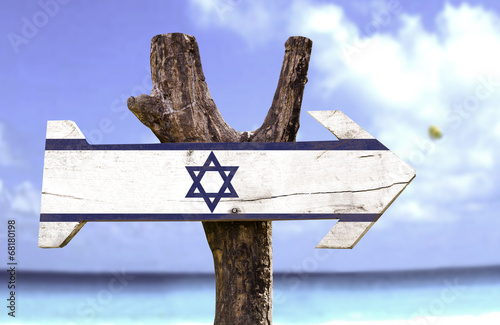 Israel wooden sign with a beach on background photo