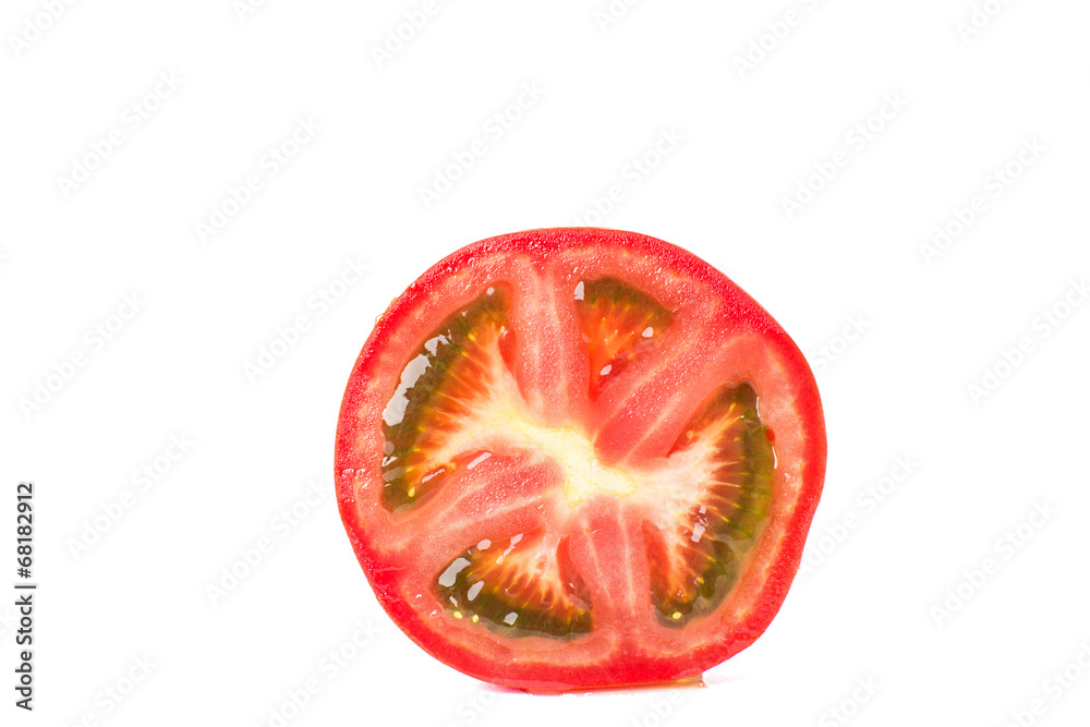 slice of tomato isolated on white slice of tomato isolated on white