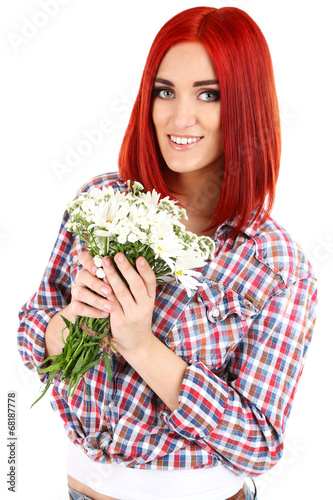 Beautiful young woman holdi...