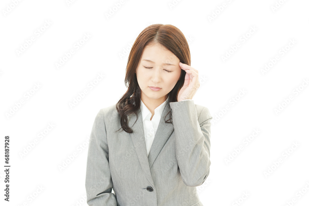 頭痛に悩むOL 頭痛に悩むOL