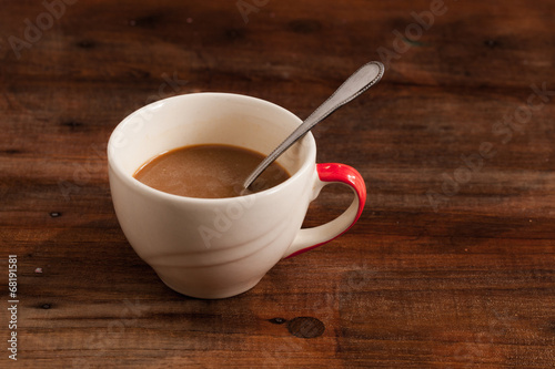 coffee cups on wood background.