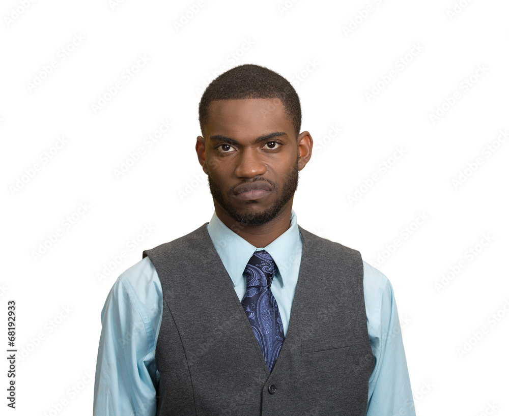 Portrait Grumpy, skeptical, displeased man, grey wall background Portrait Grumpy, skeptical, displeased man, grey wall background