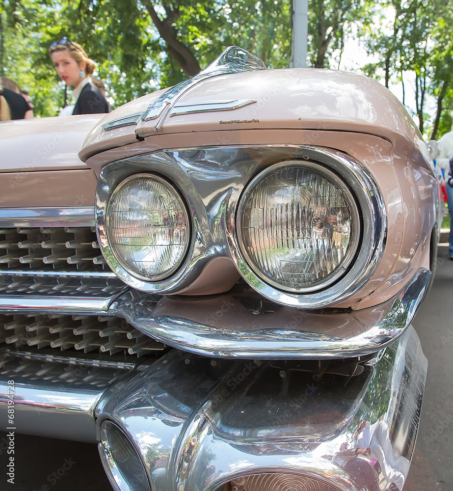 Headlight of old American car on show of collection cars