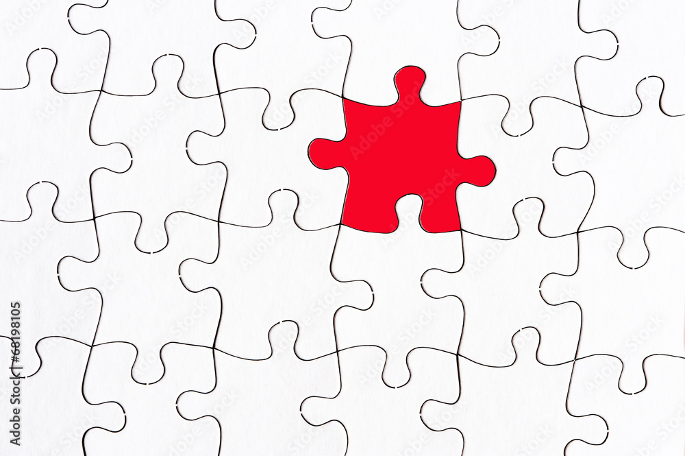 Obraz premium blank jigsaw with one red piece