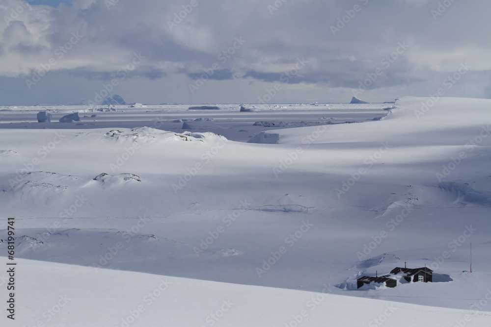 old scientific Antarctic station of snowy expanses of the Antarc