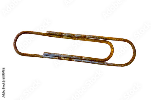 rusty paper clip isolated on white background