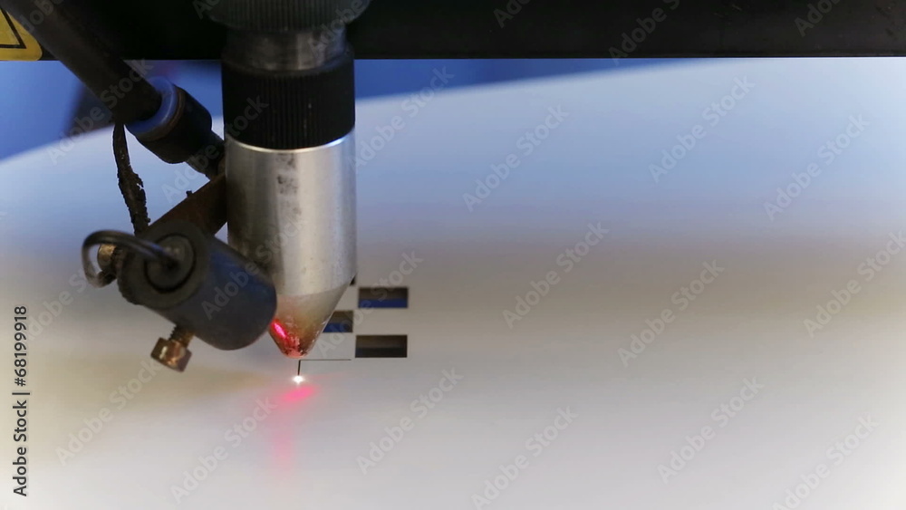 Laser cnc machine cutting square pattern on acryl plate Laser cnc machine cutting square pattern on acryl plate