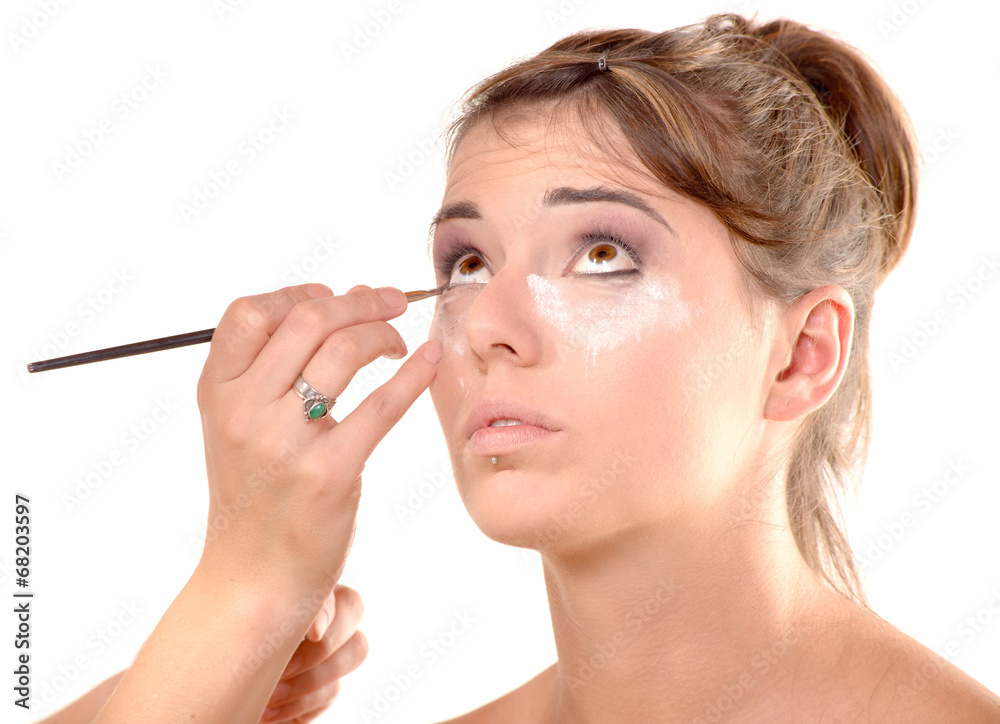 pretty young woman is make up pretty young woman is make up