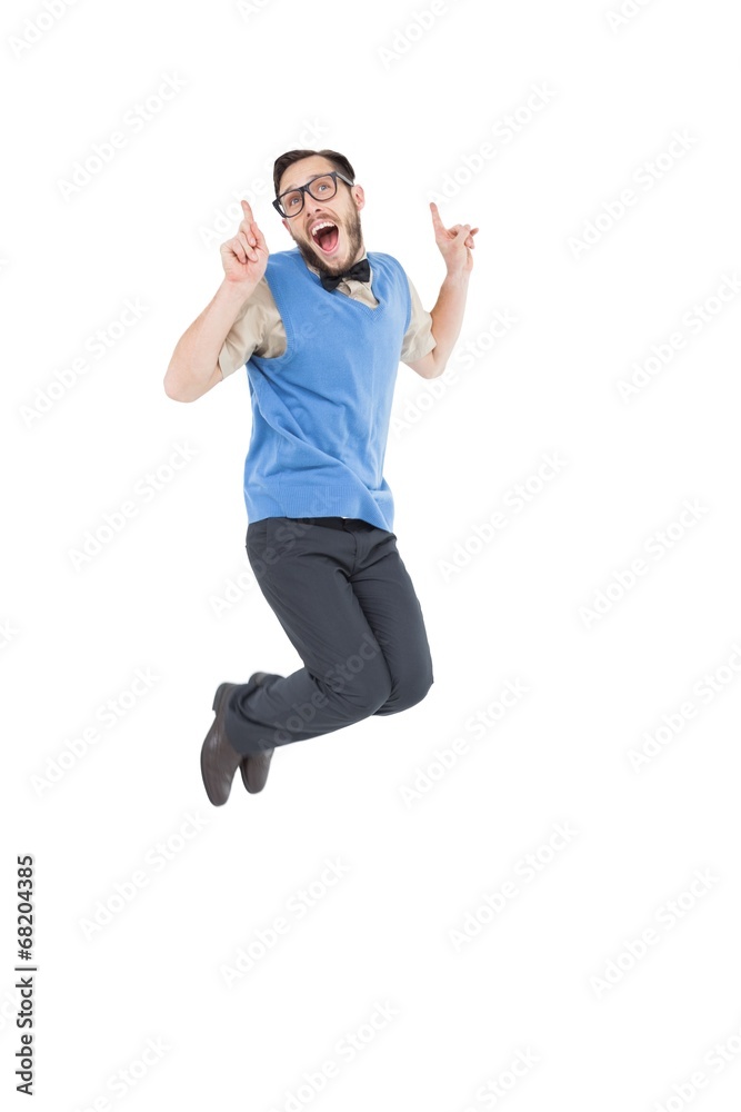 Geeky hipster jumping and smiling