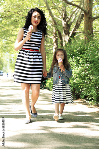Happy mom and daughter. Wal...