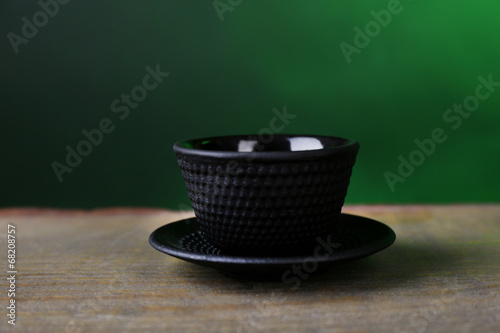Chinese traditional bowl for tea on wooden background
