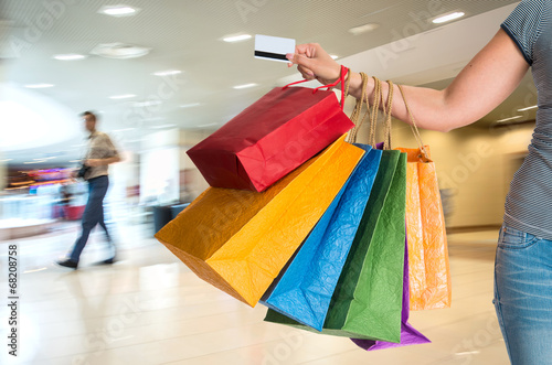 Female holding shopping bags