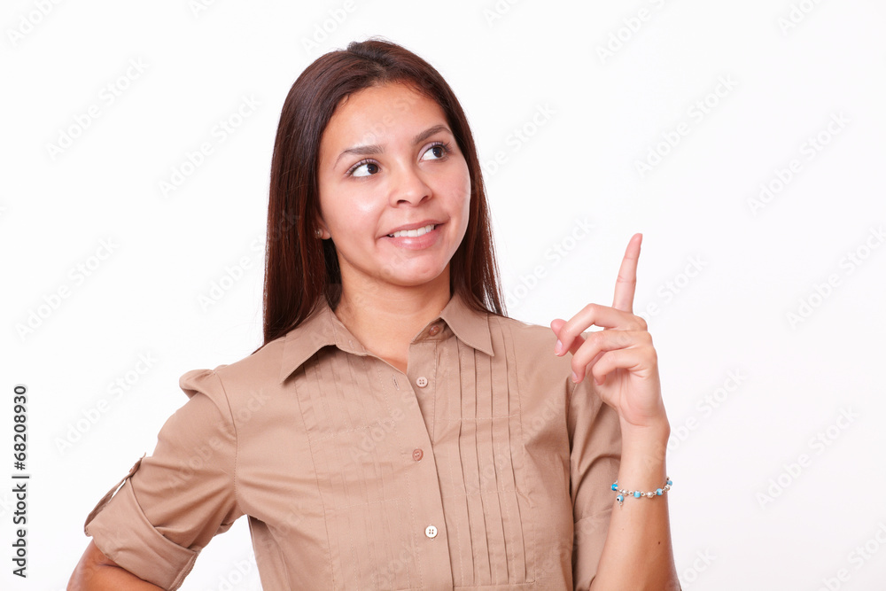 Charming young lady with pointing gesture Charming young lady with pointing gesture