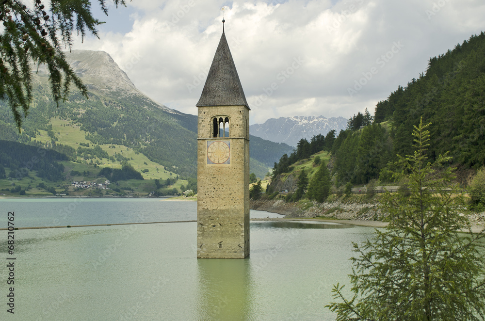 Italy, sunken church spire in Lago di Resia