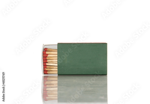 Safety matches in green box.
