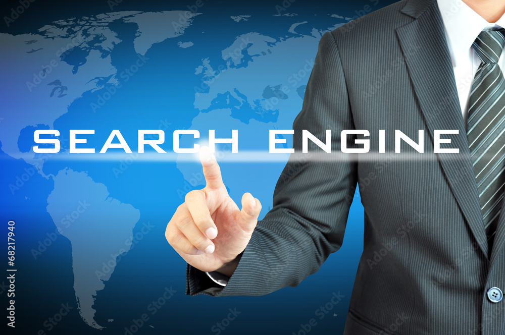 Businessman hand touching SEARCH ENGINE sign on virtual screen Businessman hand touching SEARCH ENGINE sign on virtual screen