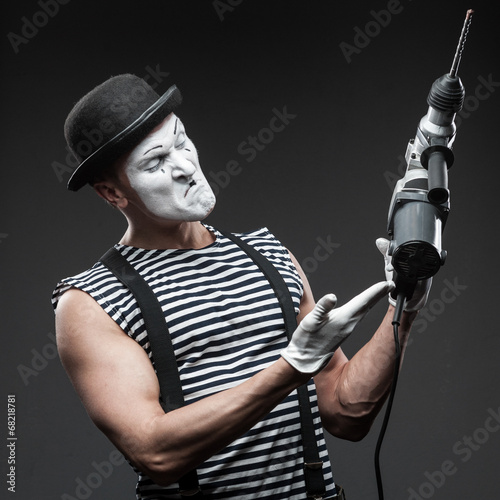 mime with hammer drill