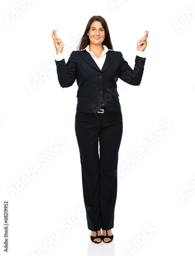 Business woman has her fingers crossed