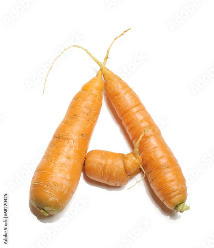 Alphabet letter A arranged from fresh carrots isolated