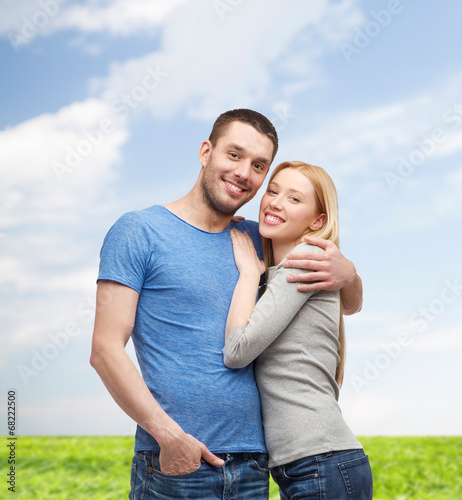 smiling couple hugging